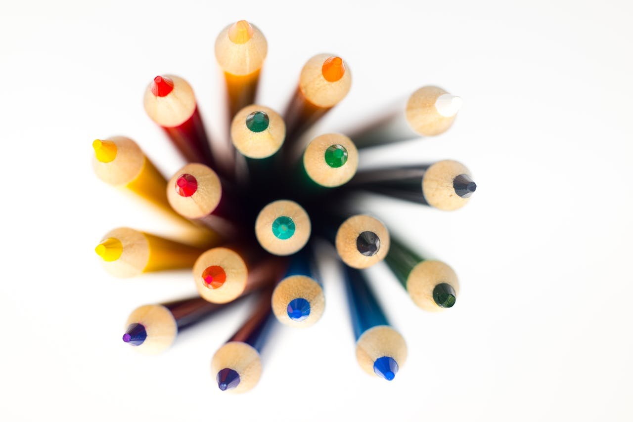 Shallow Focus Photography of Color Pencil Lot